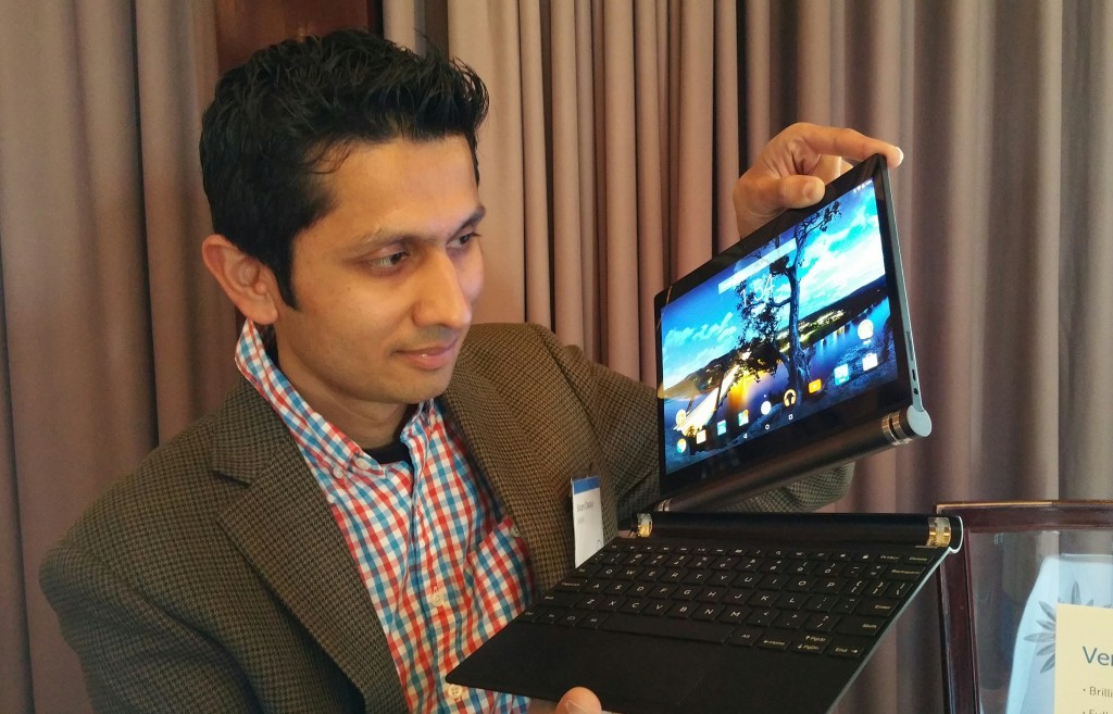 Dell's Vikram Chadaga with the new Dell Venue 10 7000 Android Tablet with magnetically detachable baklit keyboard.
