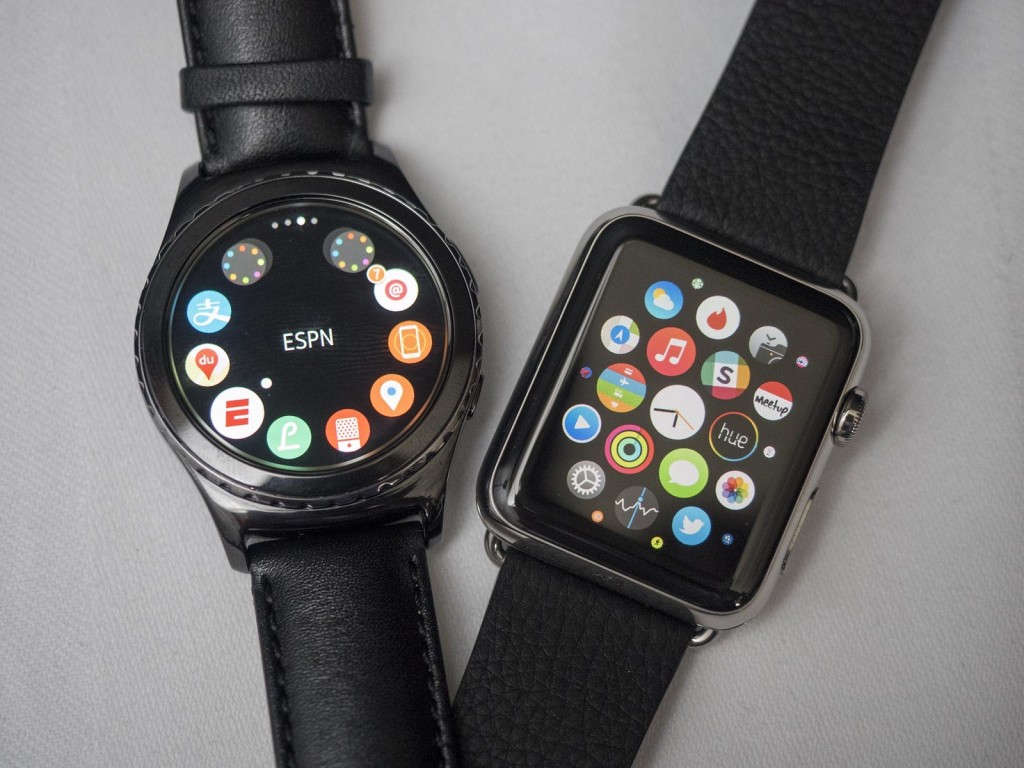 Samsung Gear, left, one-ups the Apple Watch with its own cellular capability.
